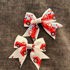 Pigtail bows with red trucks and hearts